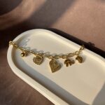 Golden Brush Charm Bracelet - Image 3